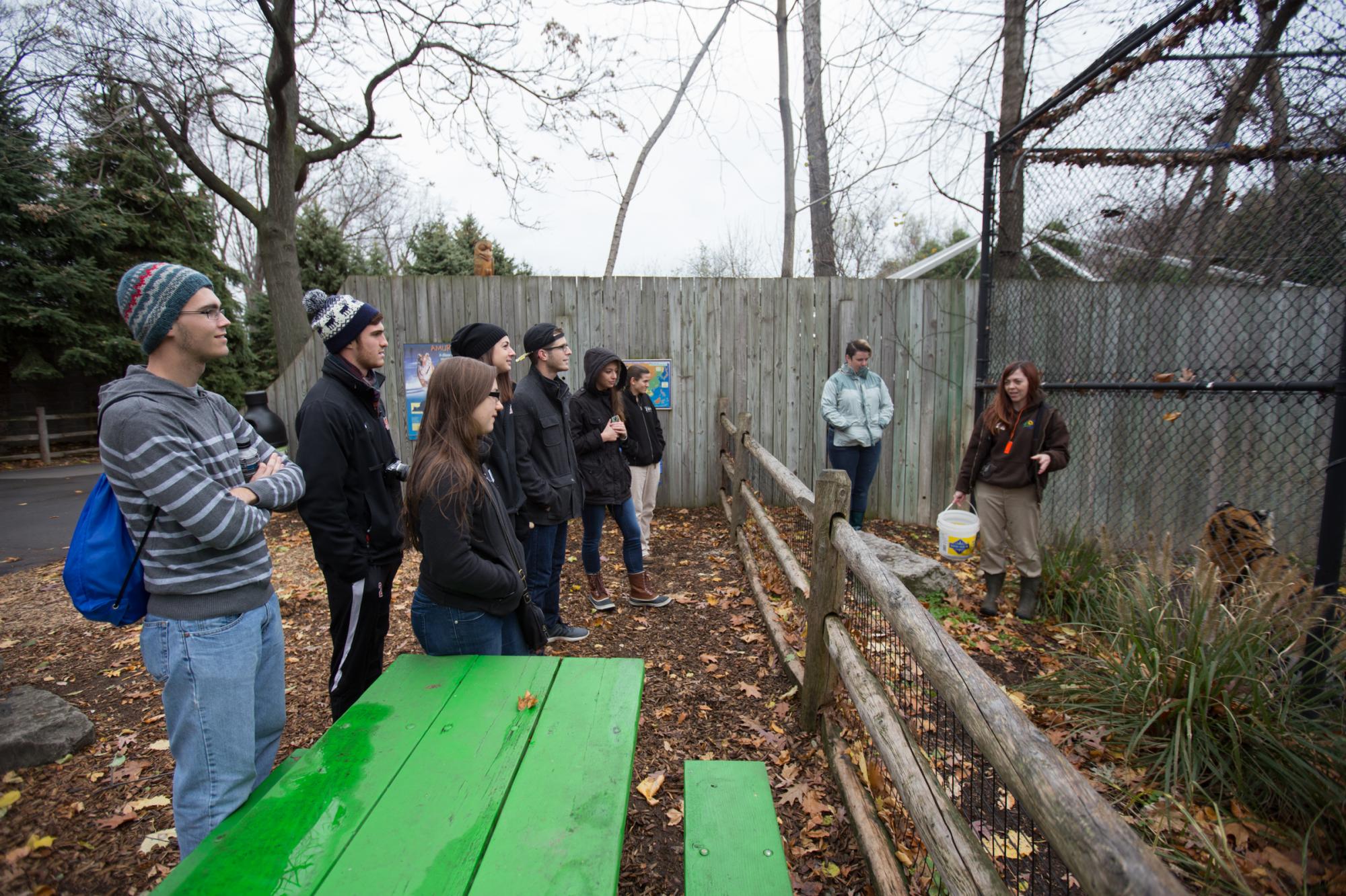 Students listen to Seneca Park Zoo keeper about tigers on Nov. 14, 2015. Photograph by Joey Ressler