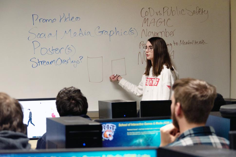 Stevie West, the production director for RIT Esports and third year film and animation major, leads an Esports meeting on Oct. 25, 2019 in Henrietta, N.Y. The team had a competition in the coming weeks to prepare for. Photo by Marielle Scott