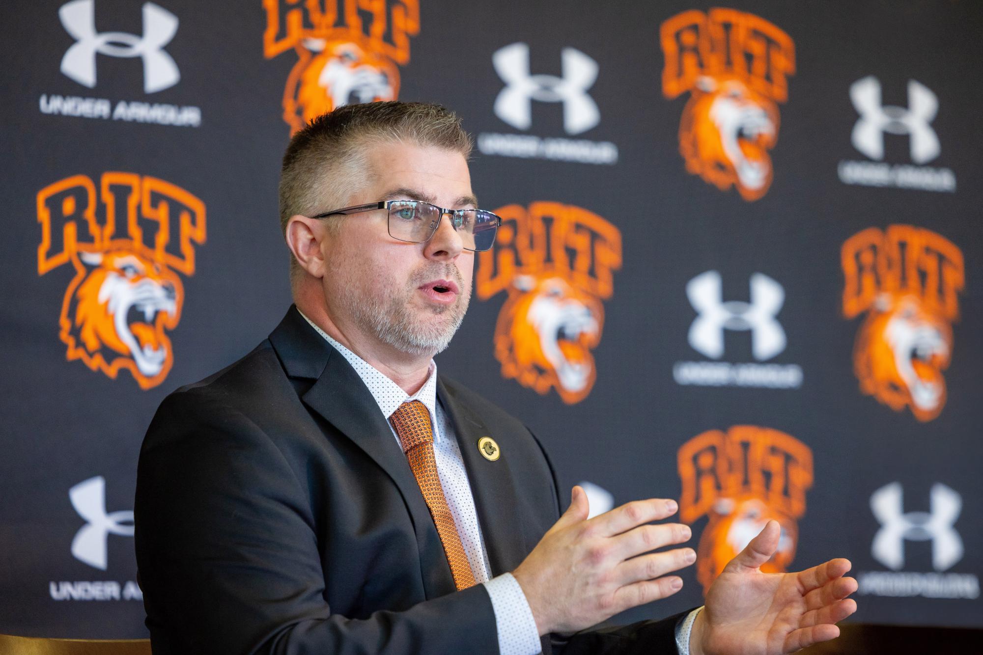 Matt Thomas addresses media, staff, alumni and players during his introductory press conference on April 17, 2025. Photography by Carlos Ortiz of the University News.