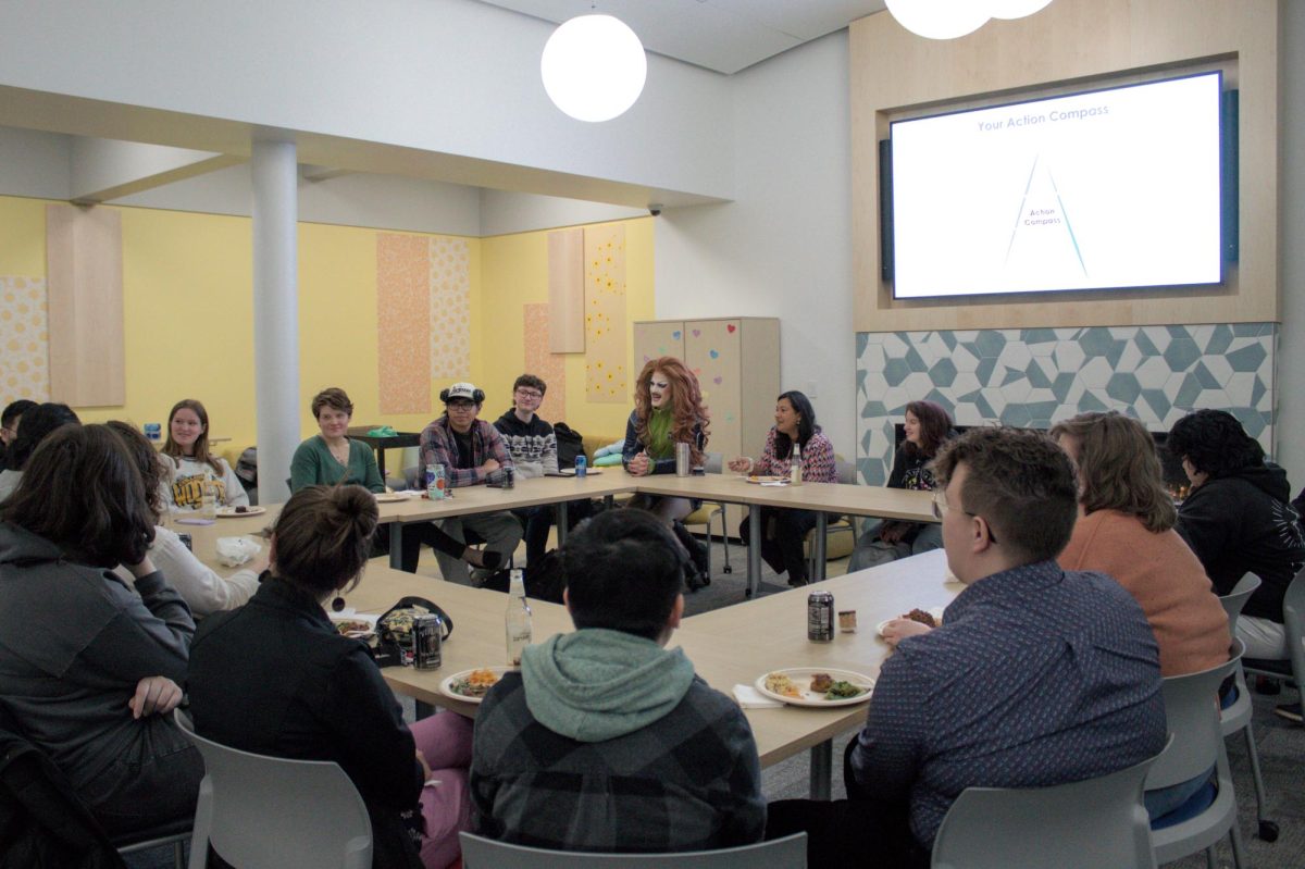 Climate activist Pattie Gonia spoke with students about identity and activism while encouraging collaboration as a way to create change.