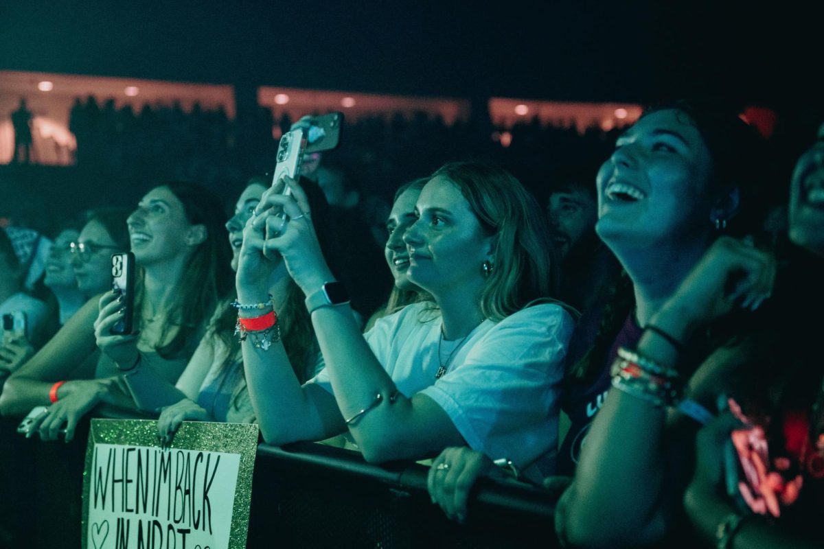 Audience members react to Djo's performance on Sept. 24, 2025, at RIT's Gordon Field House in Henrietta, N.Y.