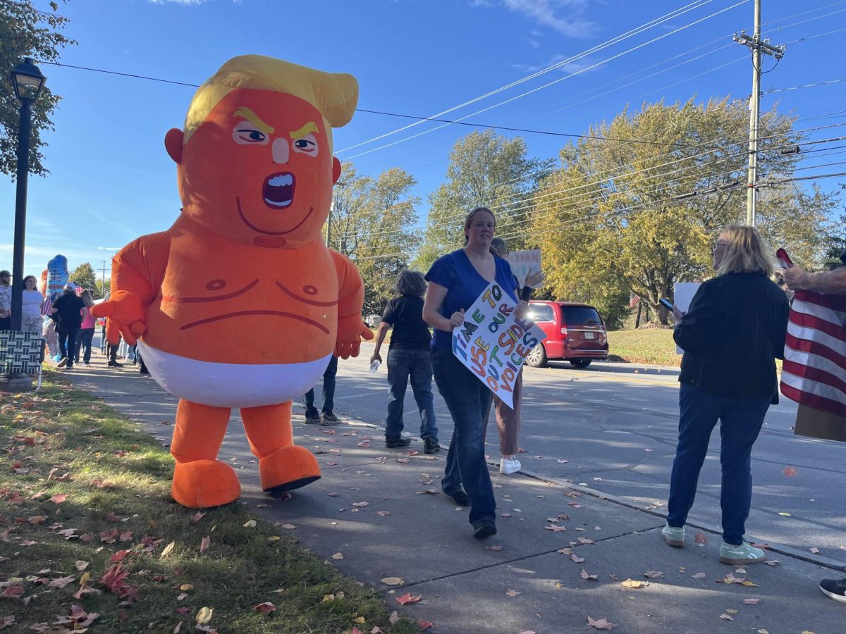 Protesters at the 'No Kings Protest' in Henrietta, N.Y. on Oct. 18, 2025.