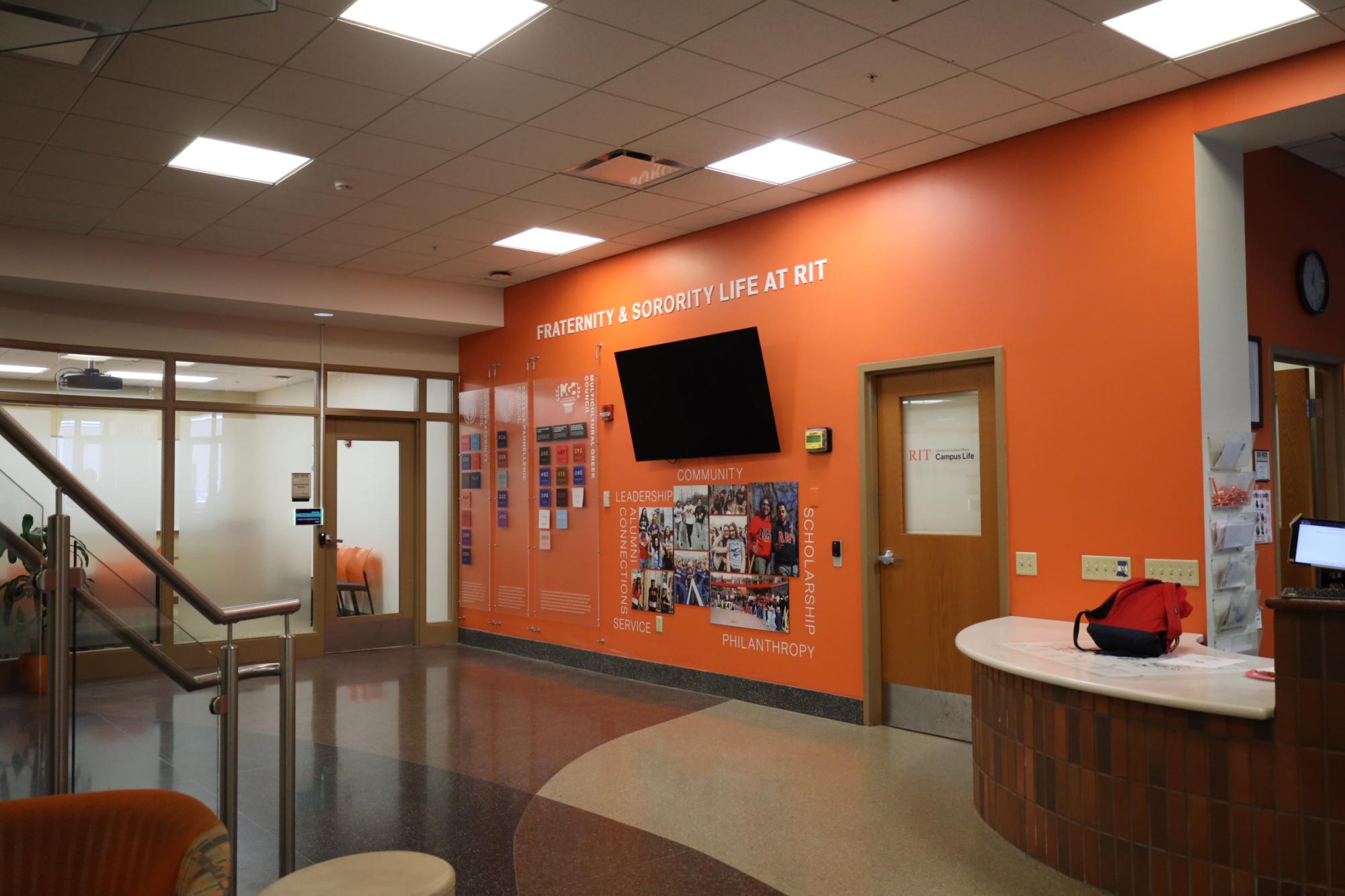 Fraternity and Sorority Life (FSL) wall in the Camps Center has been installed to replace the longstanding tradition of hanging Greek organization flags in the Student Alumni Union (SAU).