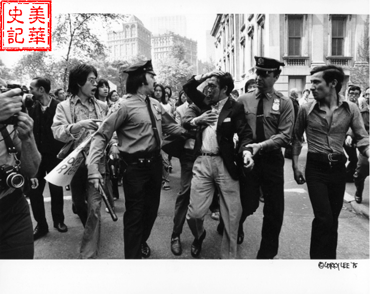 A bloody middle-aged Chinese man was dragged from the scene during the conflict. Photo by Corky Lee. (Written by Xin Su). 