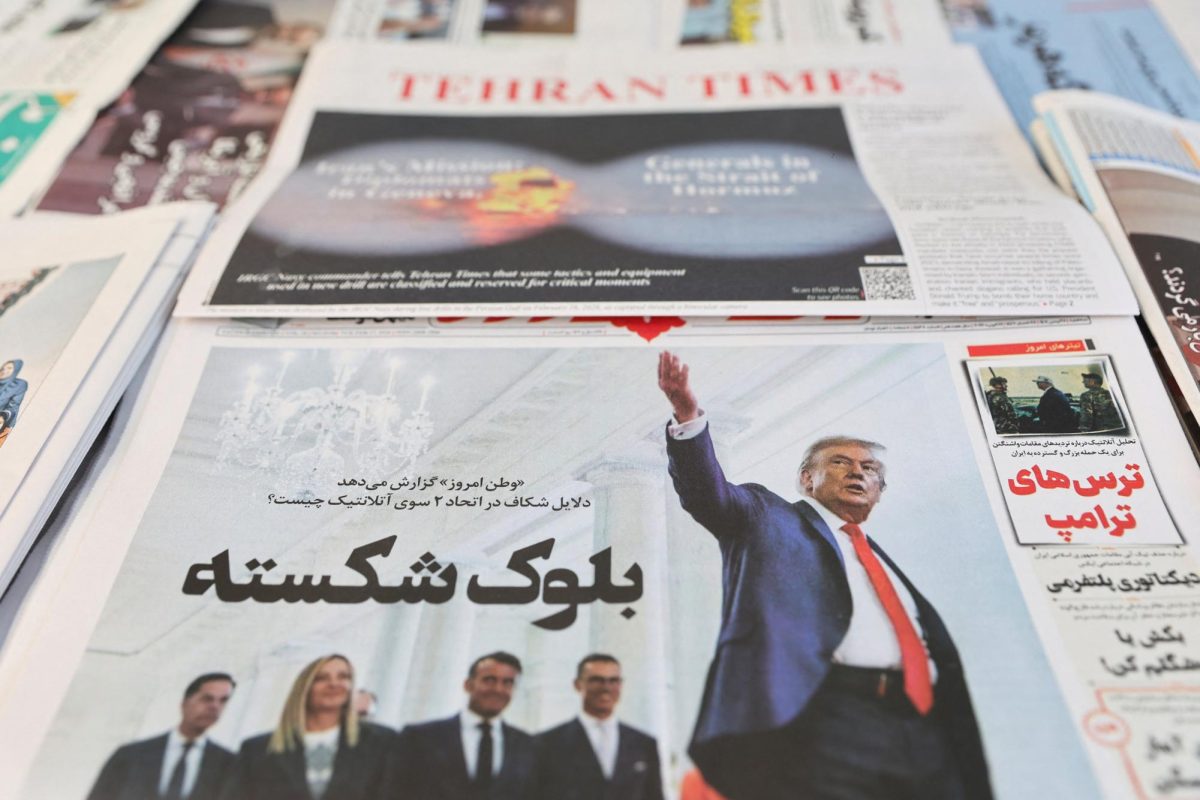 An Iranian newspaper with a cover photo of U.S. President Donald Trump, in Tehran, Iran, February 17, 2026. Majid Asgaripour/WANA (West Asia News Agency) via REUTERS