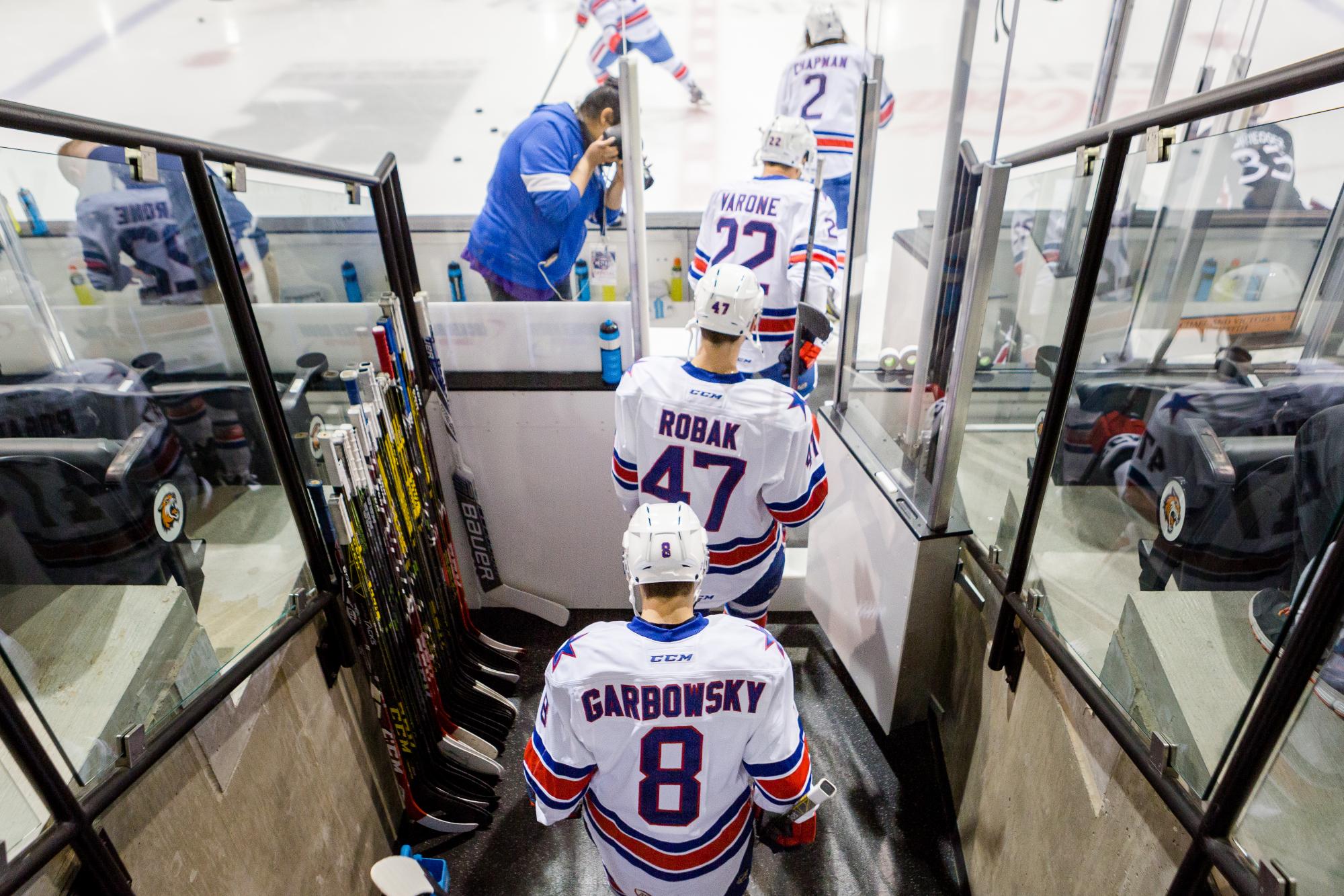 Matt Garbowsky enters the ice with the Rochester Americans at the Gene Polisseni Center on Oct. 1, 2015. Photograph by Rob Rauchwerger.
